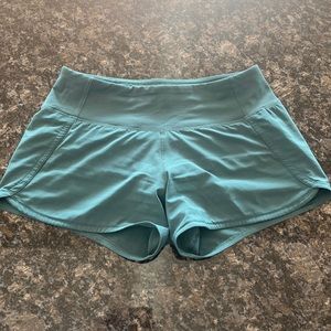 Teal Lululemon shorts size 4